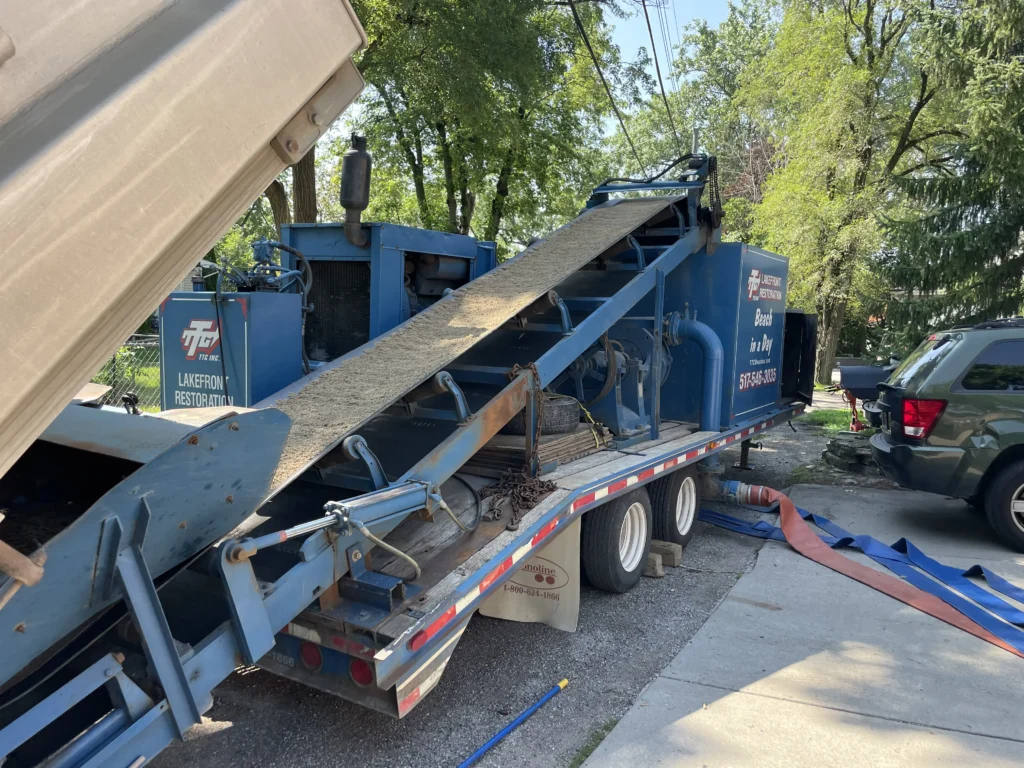 The sand pro system getting ready to begin pumping the sand slurry for the beach sanding on Cass Lake MI.